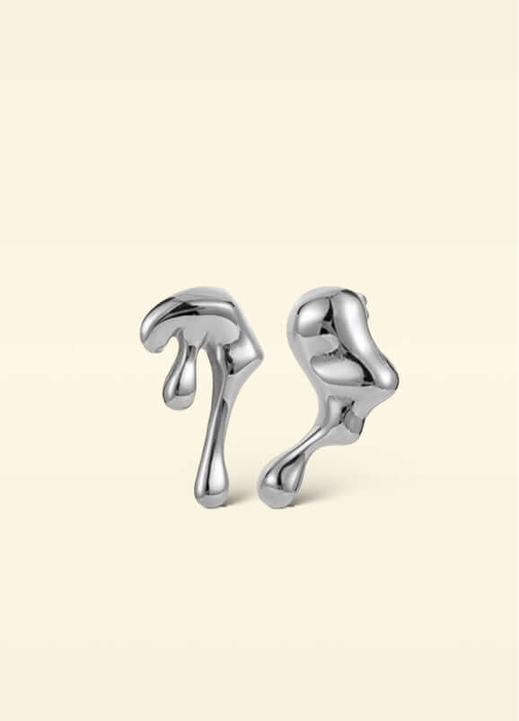 Boucles d'oreilles Mera en argent en acier inoxydable au design asymétrique
