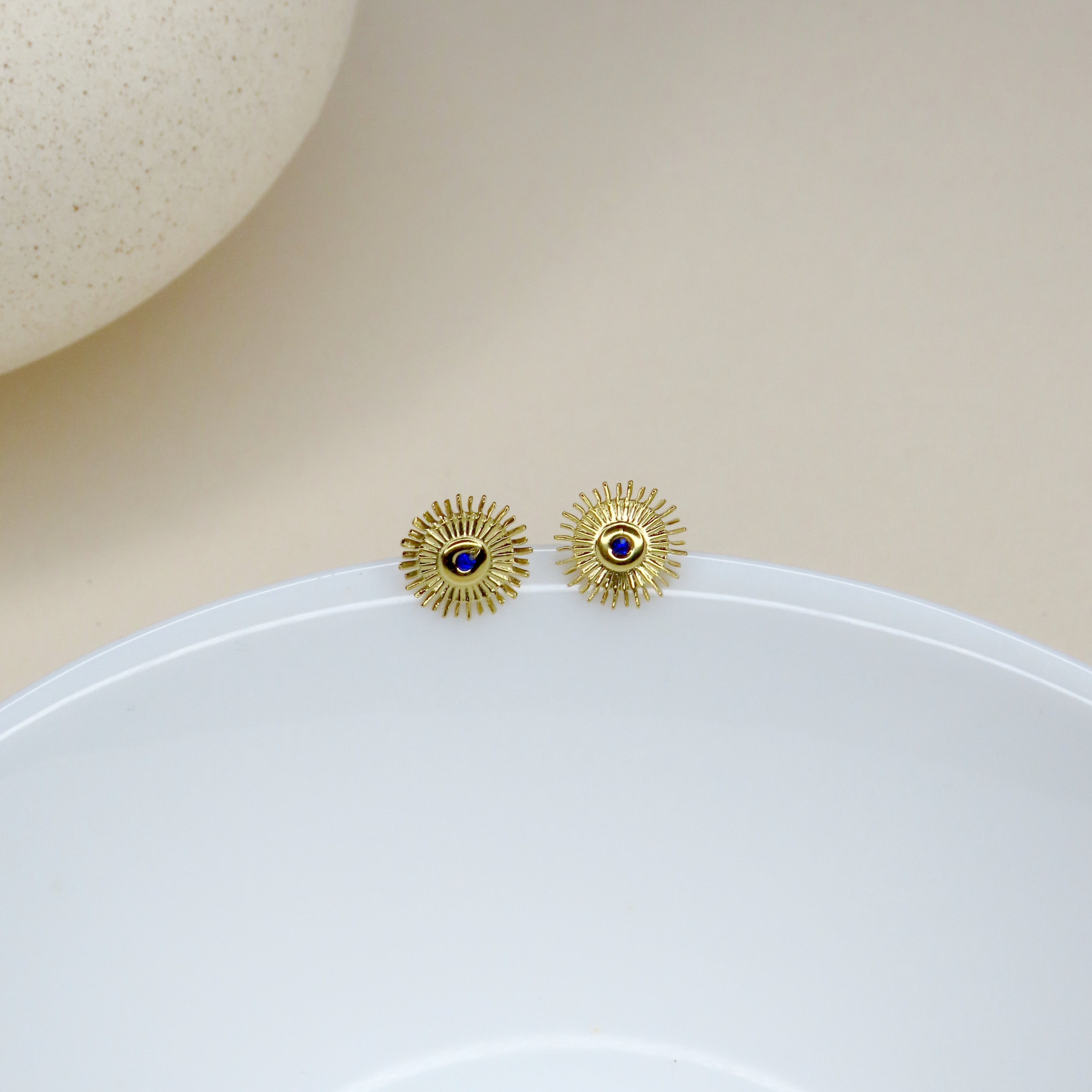 Minimalist stainless steel stud earrings with blue stone
