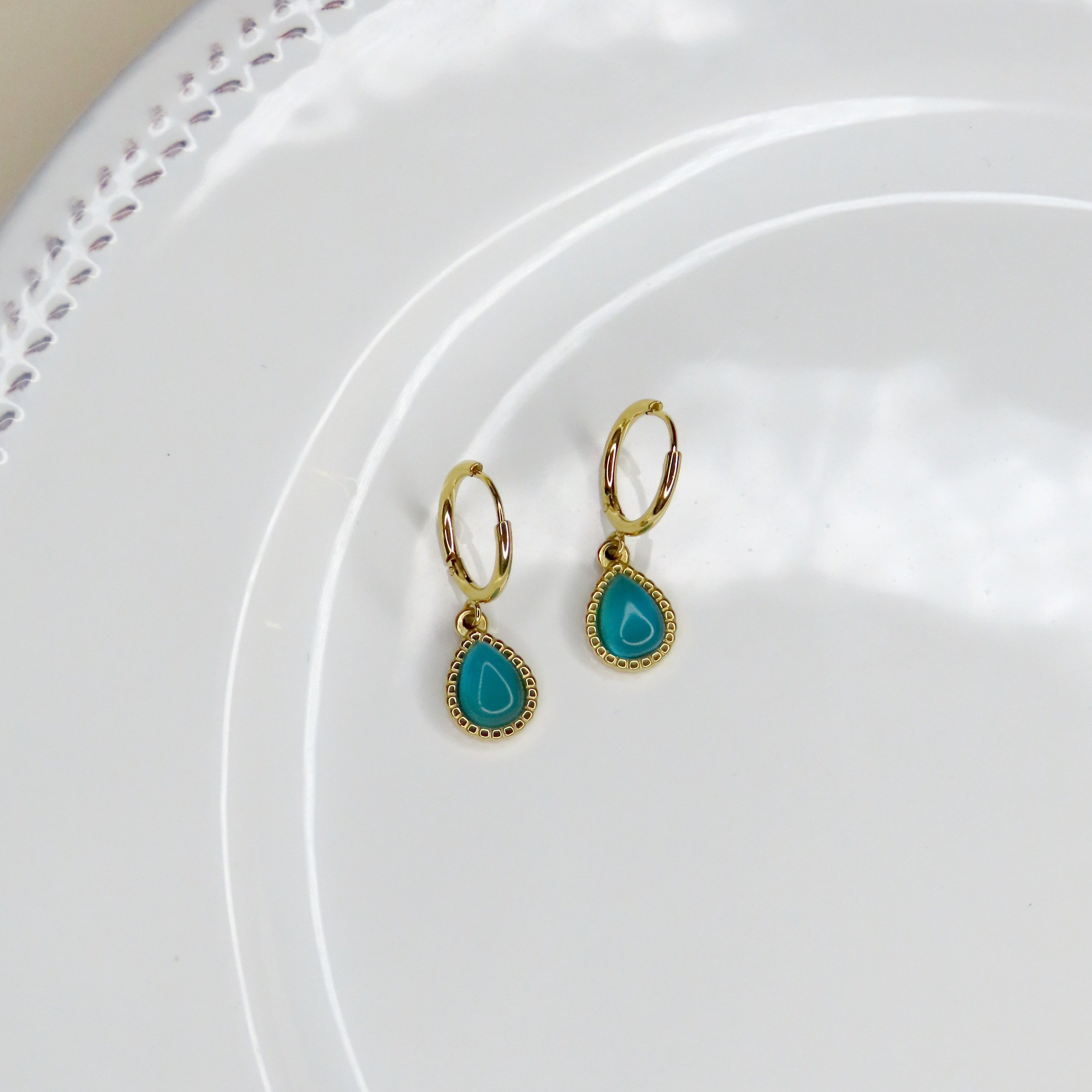 Simple blue teardrop stone hoop earrings made of stainless steel