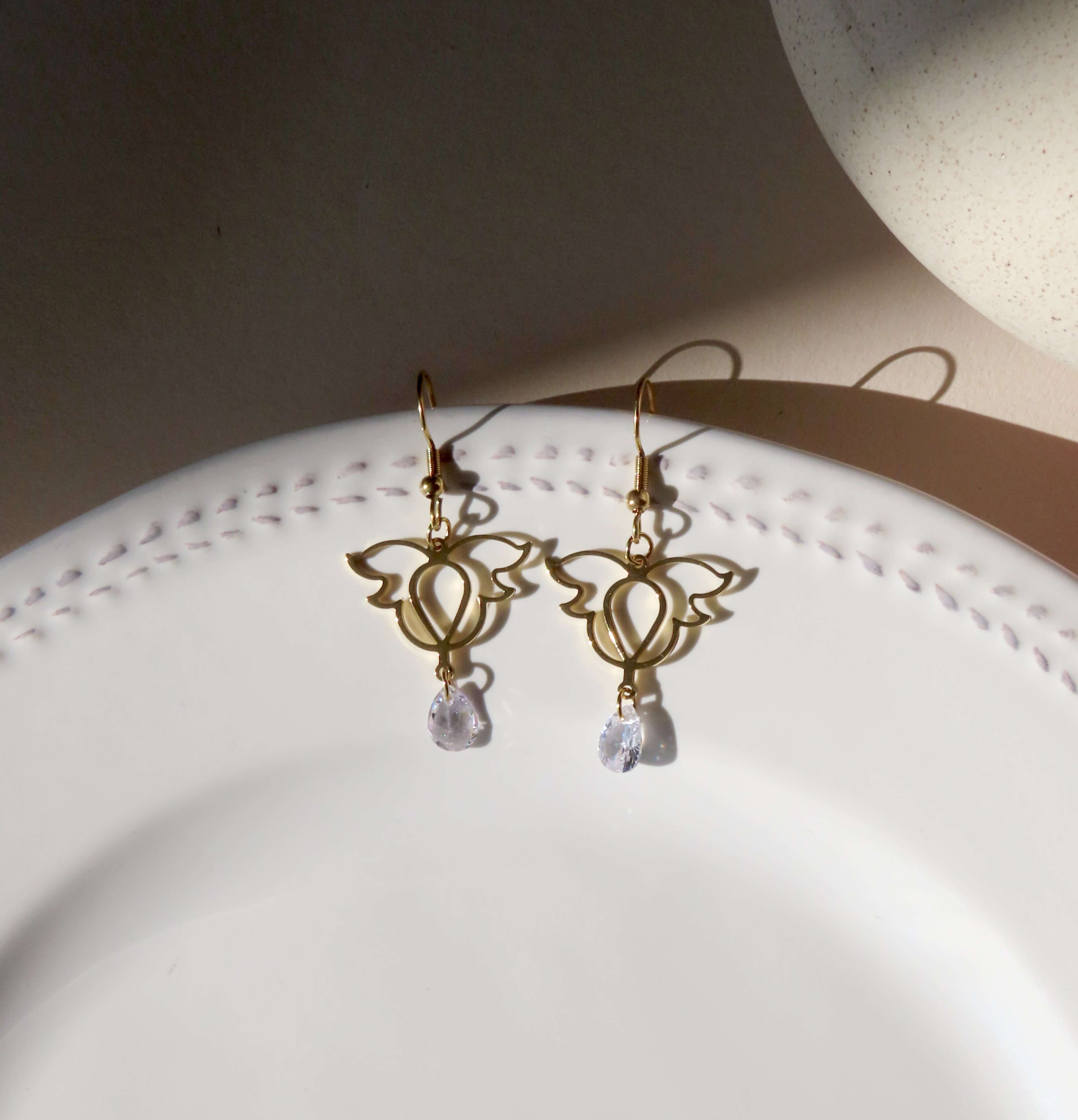 Boucles d'oreilles ailes en acier inoxydable