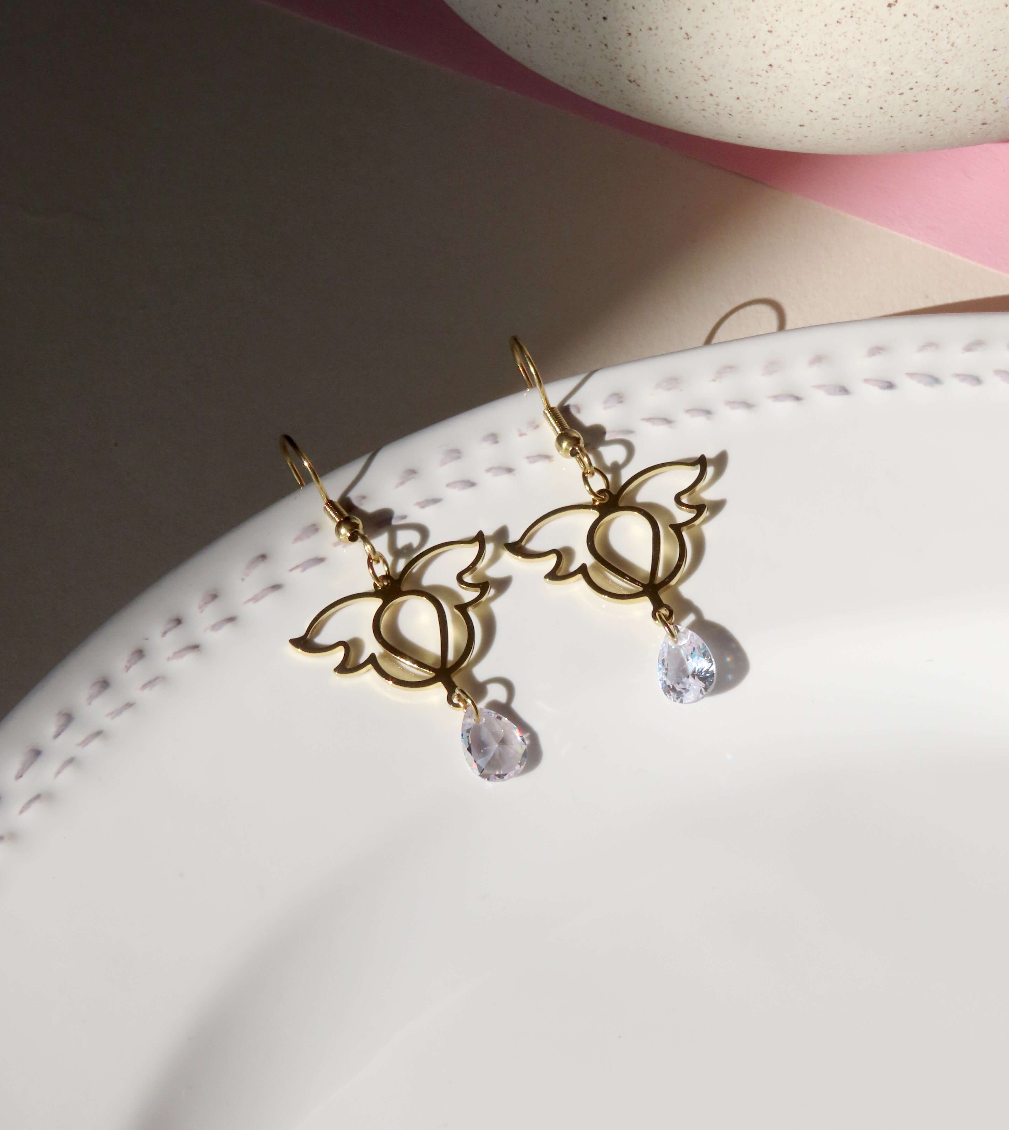 Boucles d'oreilles ailes en acier inoxydable